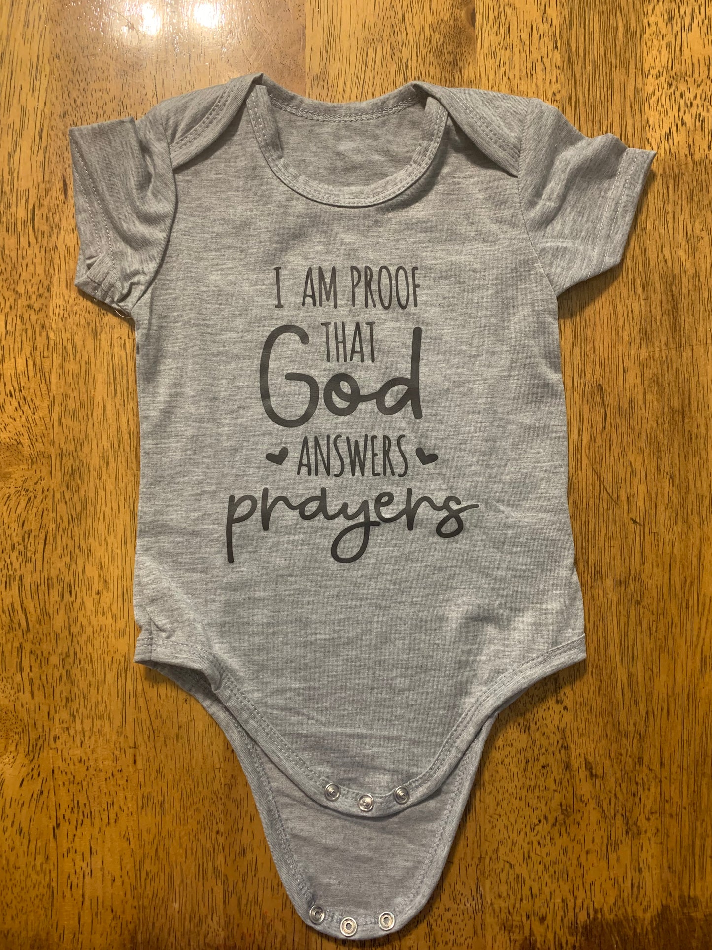 I am Proof that God Answers Prayers Baby Bodysuit Onesie