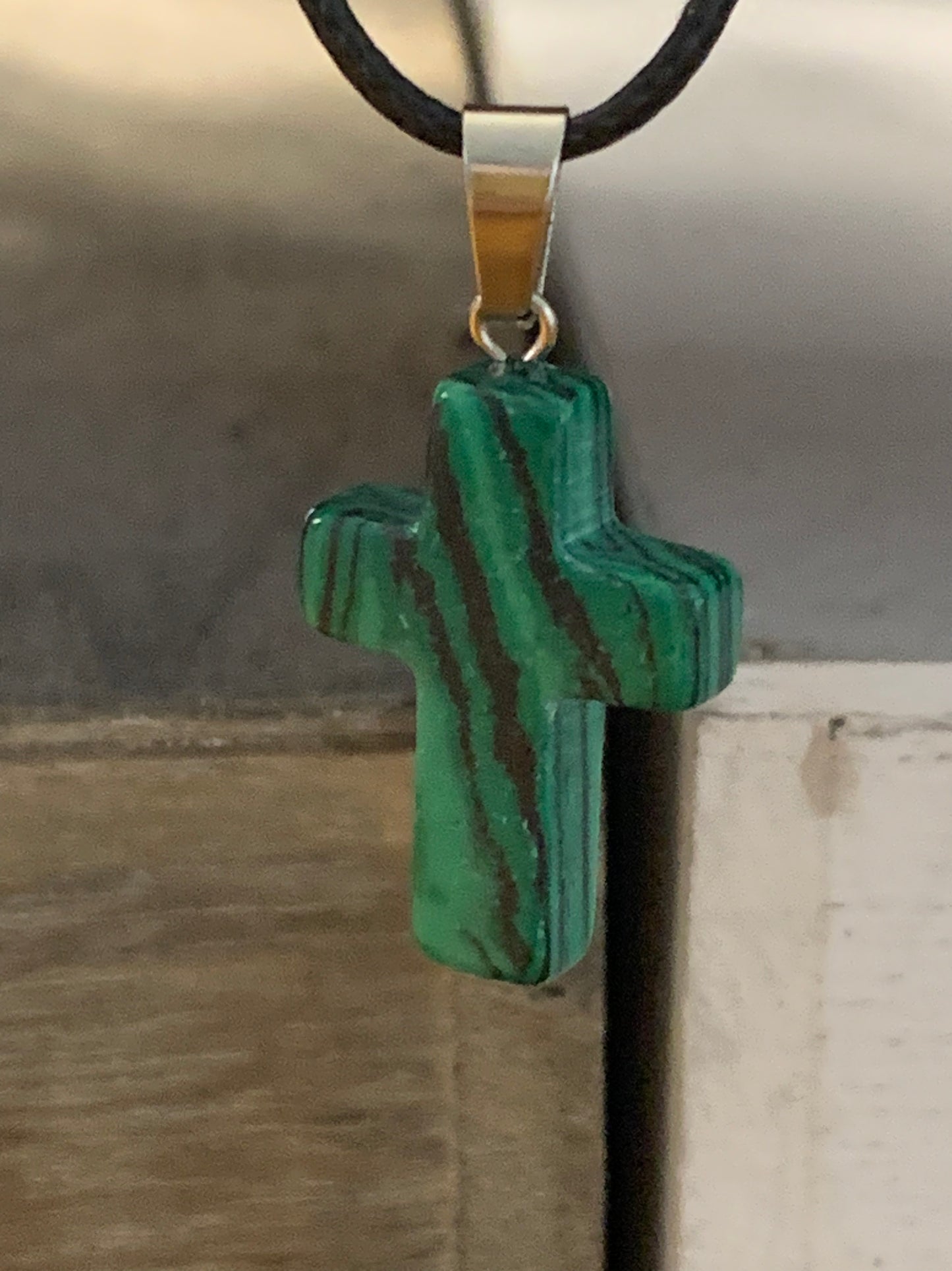 Natural Stone Cross Malaquite (deep green) with Black Cord in Stainless Steel