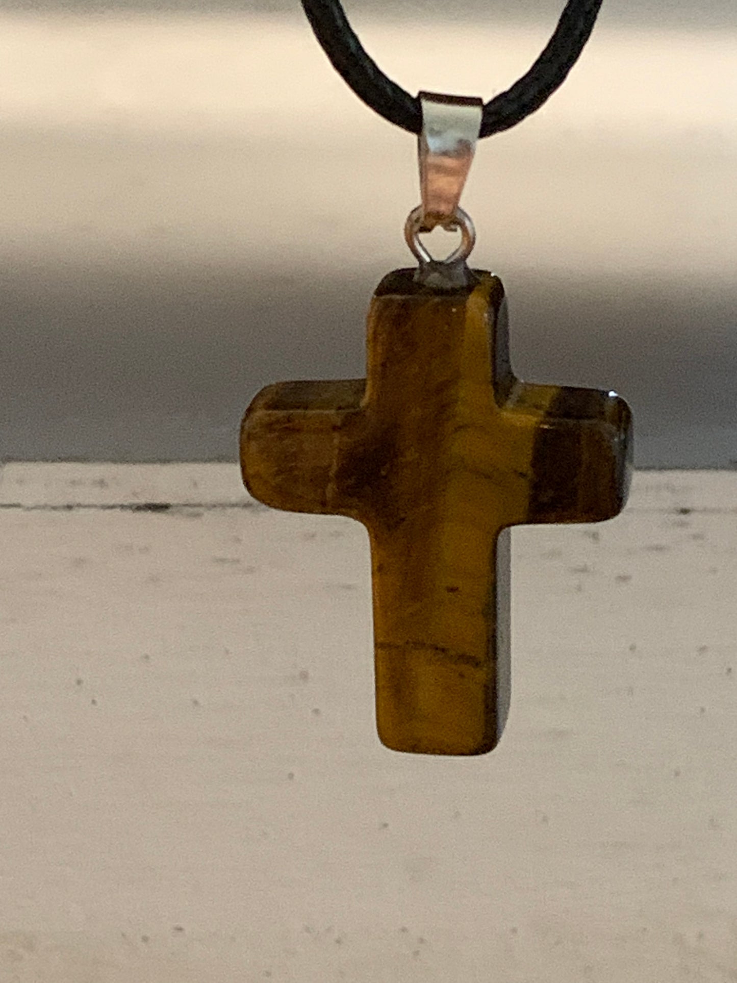 Natural Stone Cross Tiger’s Eye (Gold and Brown Color) with Black Cord in Stainless Steel